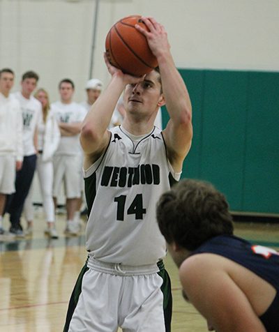 Westwood’s Aidan Fitzgibbon (14) steps up and sinks a free throw late in the third quarter. Photos by Michael Flanagan
