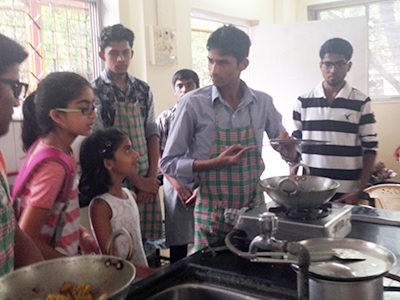 Each year, Sanah and Sanya Goenka visit India to see a different site AIF helps. Their past trip was to a site for the blind. Photos by Katrina Margolis