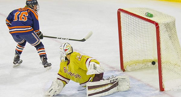 Conor Foley (16) puts the puck past BC...
</div>
<a href=