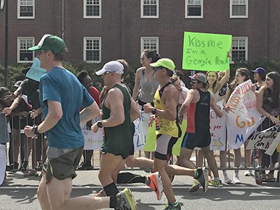 Wellesley College students, as they have since 1897, cheered on runners at the Boston Marathon. Photos by Lisa Moore
