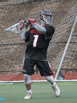 Junior goaltender Teddy Darcey made some incredible saves for the Raiders on Friday, but arguably his greatest strength was his ability to navigate the ball to open teammates on clearing attempts, as seen here. Photos by Michael Flanagan