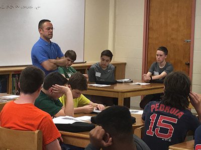 Students go to choose from 12 different professional writers, such as ESPN’s Mike Reiss. Photos by Katrina Margolis