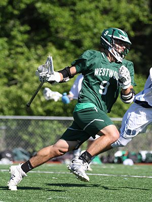Providence College commit and TVL All-Star Jake Antonucci (9) drives to the cage during Westwood’s Central/East semifinal match with Medfield. Photos by Michael Mao