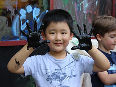 Owen shows off his painted hands. Photos by Peter Kougias