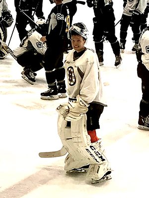 James Corcoran is all smiles before hoping in net and taking shots from some of the world’s best in Boston Bruins development camp in early July.