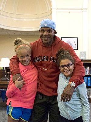 Jackson’s own children, and biggest fans, attend the storytime event at the library. Photo by Christina Perrone