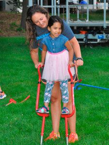 A girl stands proud while she balances to walk on a...
</div>
<a href=