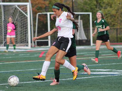 Westwood’s Leah Piscitelli (19) fights off a Ursuline defender for possession late in the second half.