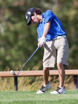 Senior Nick Marken (pictured) unleashes his seven iron during DS golf’s four-stroke win over Hopkinton on September 28.