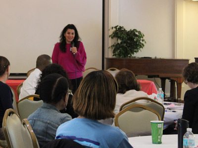 President of the World of Wellesley, Michelle Chalmers, speaks to the 2017 Diversity Summit attendees about promoting diversity and inclusion.
