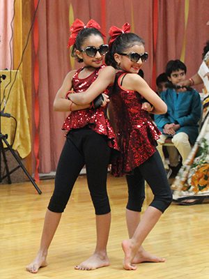 Mixing traditional and contemporary dancing, one group impresses the audience with a fusion dance to a remix of ‘Shape of You,’ Photos by Laura Drinan