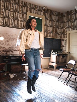 Members of the audience watch Richard, played by Madeline Bugeau-Heartt, undergo a series of highs and lows in Bugeau-Heartt’s original play, ‘A Crack of Strange Light.’