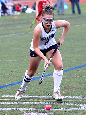 After stick handling through the legs of a North Attleboro defender, Celia Walsh (2) corrals the ball and dashes towards the cage for a scoring chance. Photos by Michael Flanagan