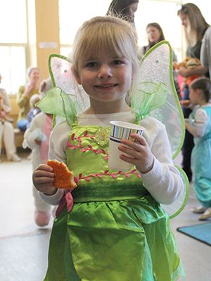 Children at the Westwood Library’s Halloween party enjoy sugar cookies, juice, and fun in their costumes. Photos by Laura Drinan