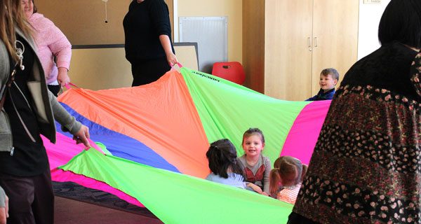 A group of girls enjoyed the parachute ride, where their parents spin them as they sit on top of the parachute. Photos by Laura Drinan