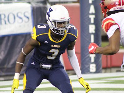 Xaverian defensive back Brian Abraham (3) gets ready to press an Everett receiver along the goal line early in the second quarter. Photos by Michael Flanagan