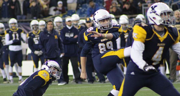 Kicker Brian Fallon watches as his 20-yard field goal attempt sails through the uprights to cut the deficit to 14-10 late in the first half. Photos by Michael Flanagan