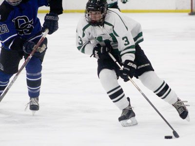 Westwood junior forward Matt Hetnik flies in down the left wing on his forehand and cuts to the cage late in the second period of Monday’s game against Dover-Sherborn.