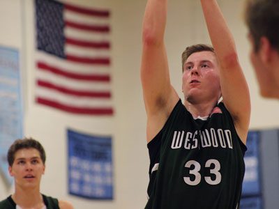 Westwood forward Justin Anderson (33) swishes home a free throw for one of his team-high 26 points during Tuesday’s 74-64 win at Medfield.
