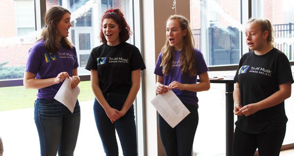 Tri-M Music Honor Society students perform Christmas carols and holiday songs at Westwood’s annual Winterfest. Photos by Laura Drinan