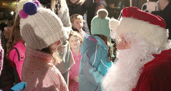 Having heard that Needham lit its Blue Tree, Santa Claus visited town to greet all of the children excited for the holiday season. Photos by Laura Drinan