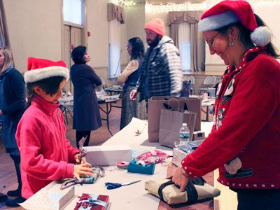 Renée and her mother, Joey, use ‘upcycled’ materials to create festive gift-wrap in preparation for Christmas. Photos by Laura Drinan