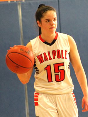 Sydney Scales (15) moves the ball up the floor for the Rebels early in the first quarter. Photos by Michael Flanagan