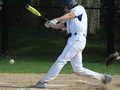 Charlie Ogletree (pictured) cracks a grounder up the third base line during the bottom of the third inning. Photos by Michael Flanagan