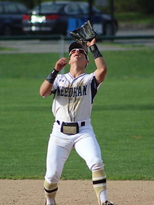 Shortstop Alex Luscher (pictured) gets ready to corral in a pop-up during the top of the third inning. Photos by Michael Flanagan