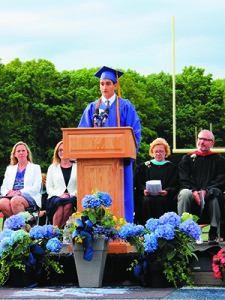 The of 2018 President, Jason Zavras, delivers his speech at the Dover Sherborn High School graduation. Photos by Laura Drinan