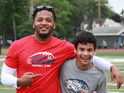 Devvon Yeager gets a picture with Patrick Chung after traveling all the way up from Maryland with his younger brother and family to attend Chung’s camp. Photos by Daniel Curtin