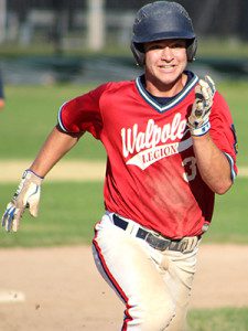 Charlie Auditore (pictured) hustles to third base after tagging up in the bottom of the second inning. Photos by Michael Flanagan