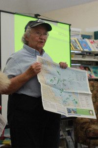 Marguerite Krupp shows a map of the Boston Harbor and its different islands. Photos by Daniel Curtin