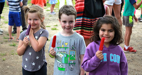 Ready for kindergarten! These young Medfielders enjoy a popsicle after their bus orientation. Photos by Daniel Curtin