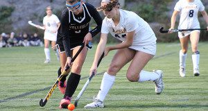 Needham defender Chloe Newman (23) battles Wellesley’s Kayla Johnston for a loose ball in 2017. Newman is one of four Rockets captains this year.