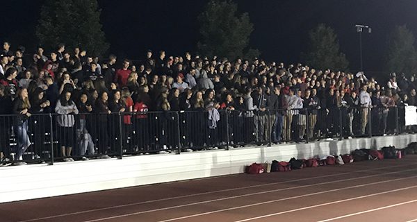 Wellesley fans watch their team defeat Newton North 27-7 on Friday night. Photos by Robby McKittrick