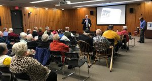 The community comes out to listen to former Harvard Football Captain Vic Gatto speak about ‘The Game.’