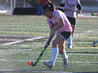 Kelly Driscoll (6) moves the ball up the field for Westwood midway through the first half of Thursday’s 2-1 defeat to Medway. Photos by Michael Flanagan