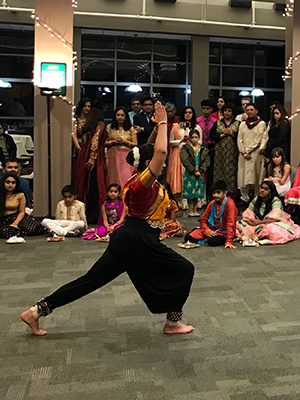 A student performs a dance at the Westwood Indian American Association’s Diwali celebration at Westwood High School. Photos by Robby McKittrick