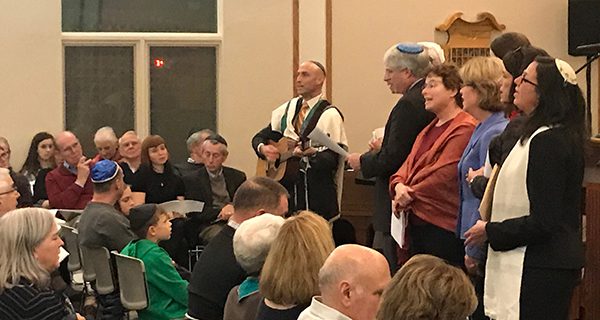 Members of the Medfield and Westwood communities come together in song at an Interfaith Thanksgiving at Temple Beth David.