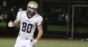 Pictured this past season against Walpole, Matt Smith (80) has made it official: the All-American tight end is headed to Duke to play football after signing his NLI on Thursday.