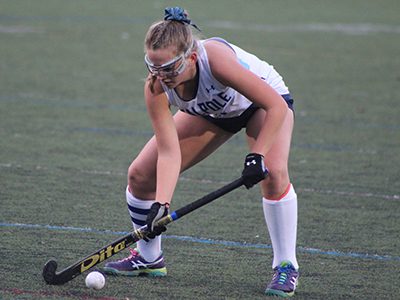 Senior Caileen Quinn (23) settles the ball on a Porker penalty corner attempt. Photos by Michael Flanagan