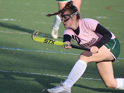 Elizabeth Watson (10) fires a shot on cage during a Westwood penalty corner attempt. Photos by Michael Flanagan