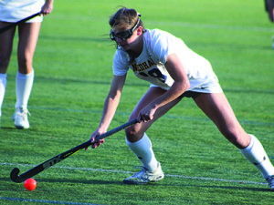 Lexi Schmalz (19), who netted the game-winner in overtime for Needham, moves the ball up the field. Photos by Michael Flanagan