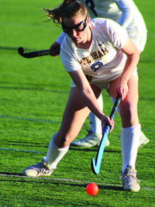 Senior forward Eileen Manning (9) corrals a pass and gets ready to fire a shot... 			
			</div data-eio=