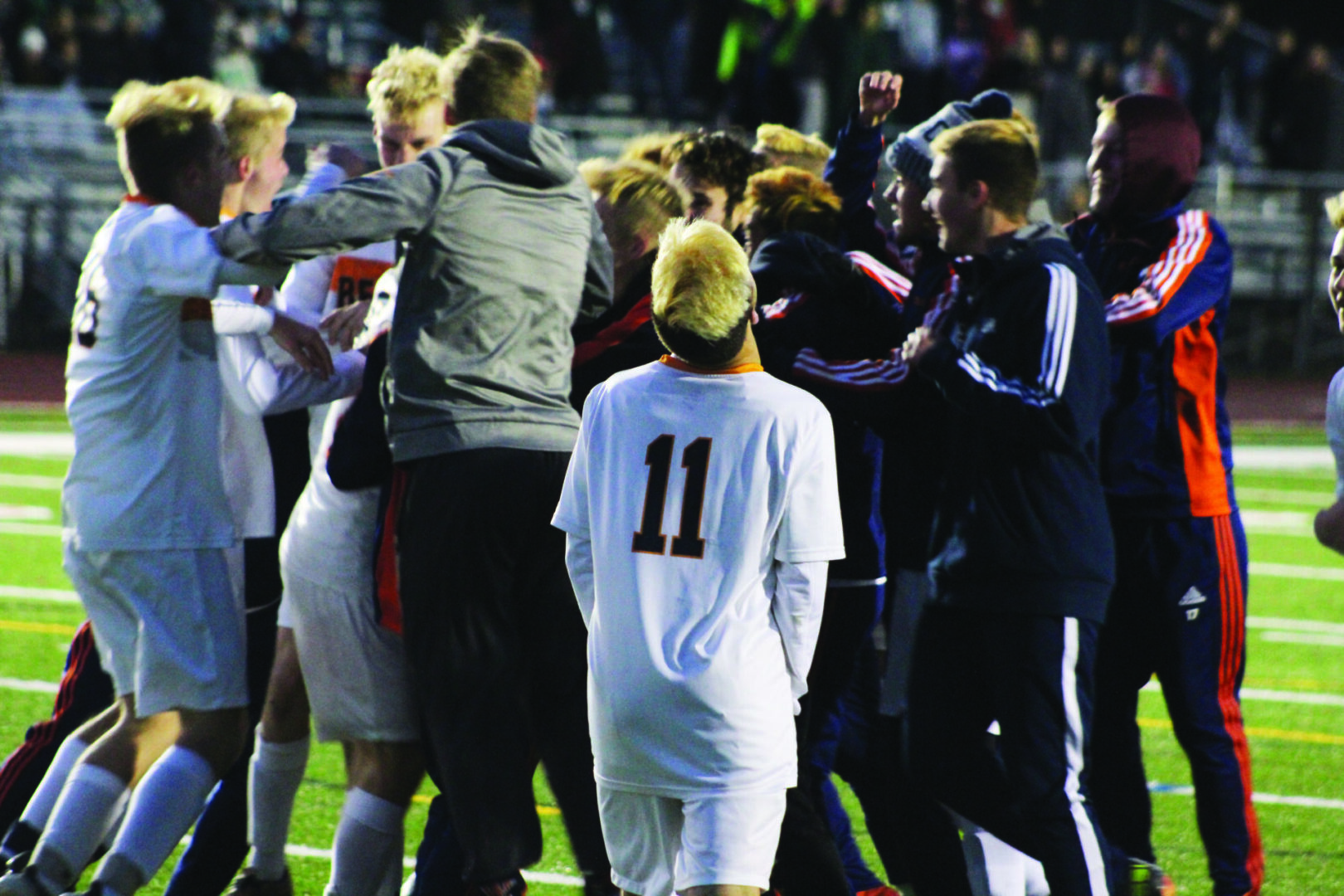 Mike DiCenzo (11) and the Rebels celebrate following their 3-1 South semifinal victory over Westwood on Saturday night at Whitman-Hanson High School. Photos by Michael Flanagan