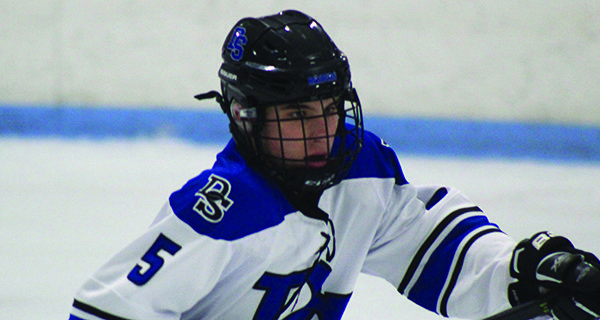 The two-way play of sophomore defenseman Billy Rooney (5) will be pivotal to DS/Weston’s potential success this season. Photos by Dover-Sherborn Hockey Club