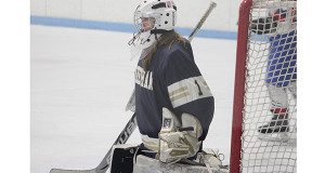 Sophomore goalie Kenzie Kelly keeps an eye on the play in front of her while recording a 15-save shutout on Saturday night in Natick.