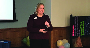 Director of Senior Services at the Tolles Parsons Center Gayle Thieme speaks during a welcome breakfast at the senior center.