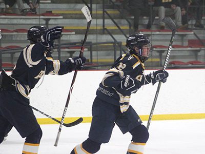 Pictured celebrating following a goal against Xaverian last season, Kurt Brinkhaus (12) will look to be continue to be a main contributor in Needham High’s offense this season. Photos by Michael Flanagan